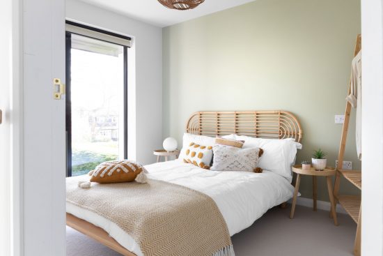 green bedroom, Natalie Holden Interiors, boho bedroom, rattan furniture,