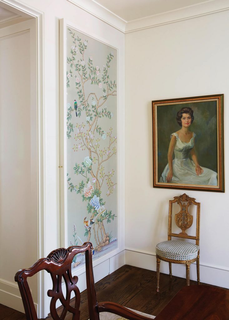 a traditional house with chinoiserie wallpaper in a frame 