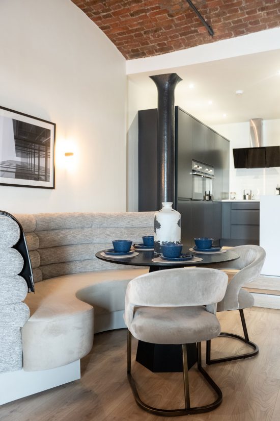 colonnades albert dock liverpool, contemporary interior design, industrial modern apartment, exposed brick apartment, warehouse, monochrome interior, natalie holden interiors, interior designer cheshire, interior designer liverpool, interior designer manchester, bespoke banquette seating,