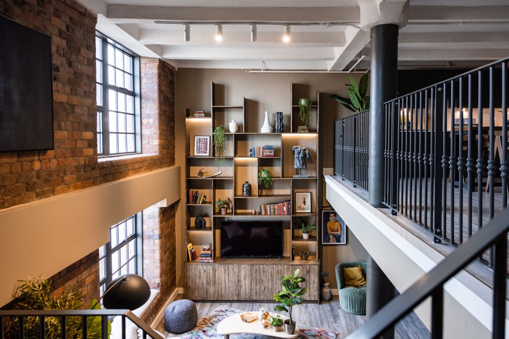 An image of the staggered shelving unit statement piece at the Tobacco Warehouse project.