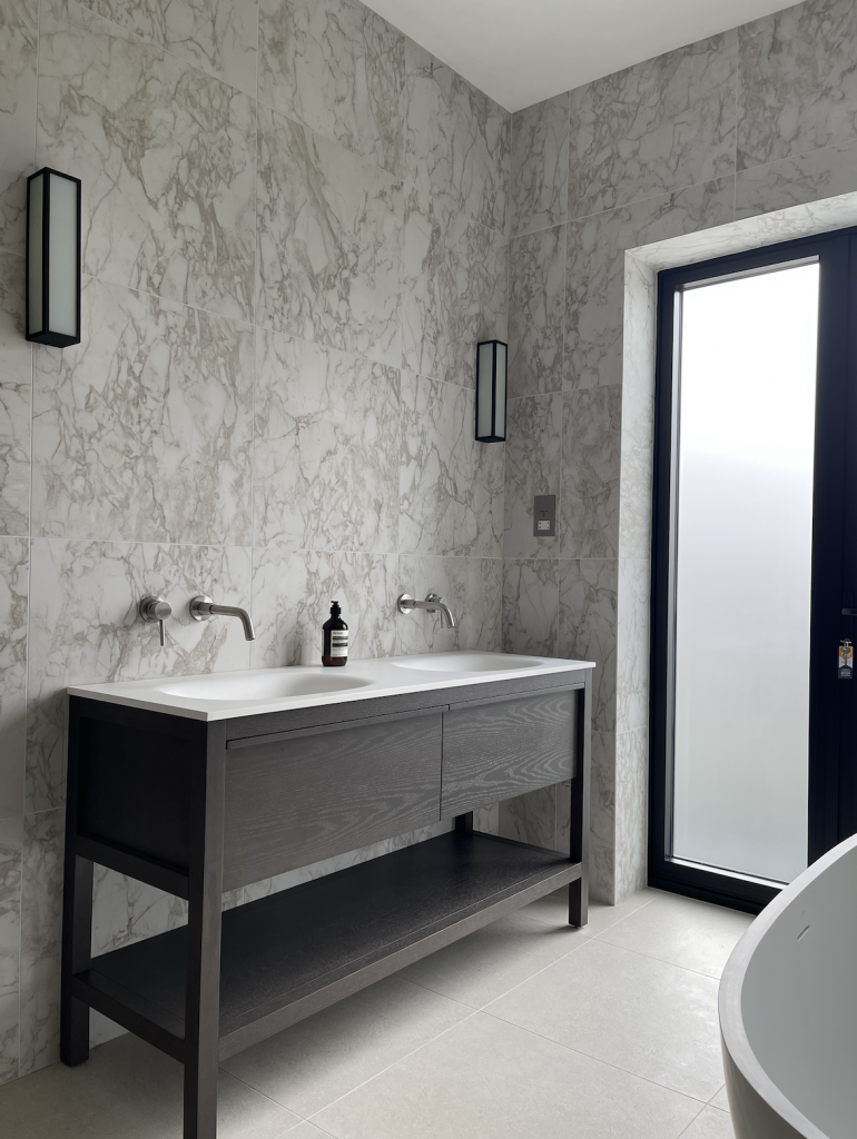 luxury bathroom design,
marble tiles, freestanding vanity, luxury interior design, high end self build home

